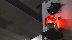 red-alarm-light-on-a-machine