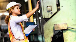female-engineer-working-on-lathe-machine