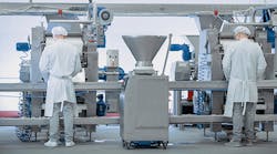 1660317237270 Twoworkersatafoodproductionline 1660317237270 Twoworkersatafoodproductionline