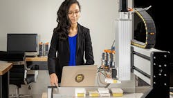 1660317252067 Femaleengineeronacomputerneararobot 1660317252067 Femaleengineeronacomputerneararobot