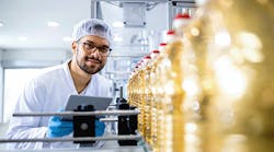 1660317255960 Manoverviewingbottleinspection 1660317255960 Manoverviewingbottleinspection