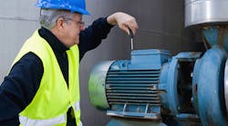 technician-performing-maintenance-on-large-industrial-motor