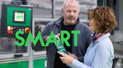 man-and-woman-speak-in-front-of-touch-screen-hmi