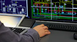 operator-at-computer-screens-montioring-process