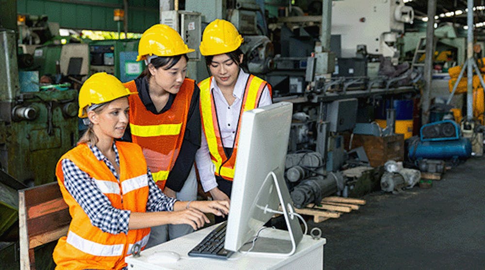 Stock-photo-of-three-female-engineers-in-front-of-a-computer