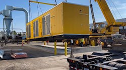 Image-of-crane-lifting-modular-compressed-air-enclosure-into-place Image-of-crane-lifting-modular-compressed-air-enclosure-into-place