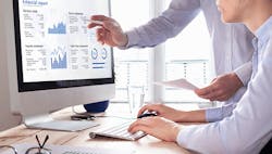 1663606651589 Twobuesinessmenreviewingfinancialstatementonacomputerscreen 1663606651589 Twobuesinessmenreviewingfinancialstatementonacomputerscreen