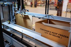 Image-of-Pearson-Packagings-case-erector-in-action Image-of-Pearson-Packagings-case-erector-in-action