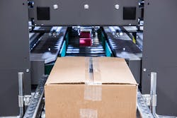 Image-of-Pearson-Packagings-case-Sealer-in-action Image-of-Pearson-Packagings-case-Sealer-in-action