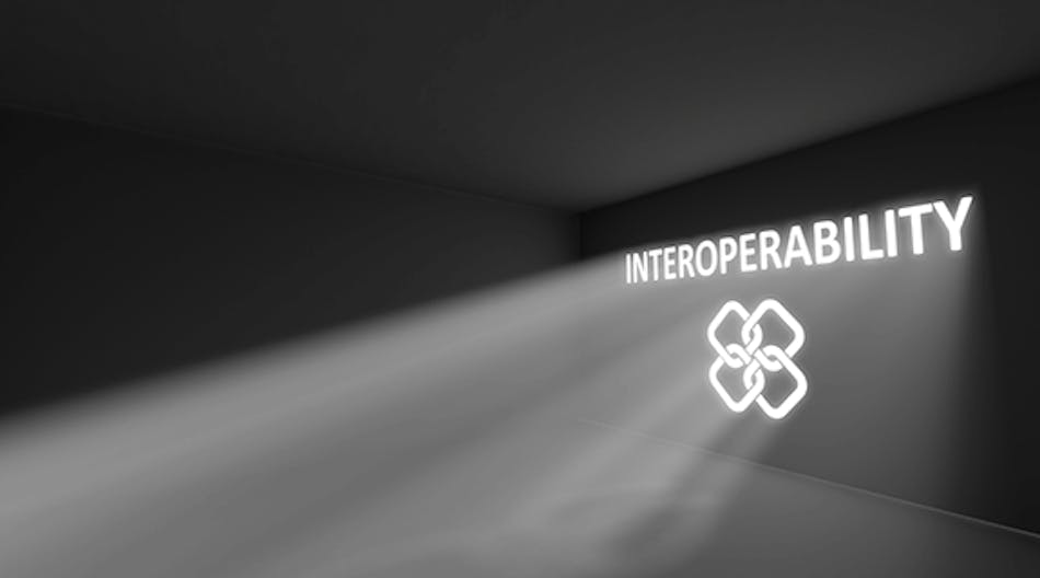 computer-generated-illustration-of-the-word-interoperability-shining-in-a-dark-room