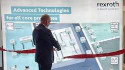 Christoph Kleu, Executive Vice President and CFO at Bosch Rexroth cuts the ribbon to inaugurate the company&rsquo;s new factory automation Customer Innovation Center.