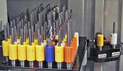 Figure 4: The colored RFID tool holders represent different sizes for tools from 3 mm to 16 mm to be loaded. Figure 4: The colored RFID tool holders represent different sizes for tools from 3 mm to 16 mm to be loaded.