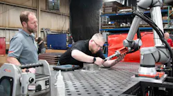 Turnkey systems for cobot welding, as seen here at sheet metal manufacturer Raymath in Ohio, is one of the solutions Universal Robots predicts will drive automation in 2023. Raymath’s CEO wrote the purchase order right after experiencing a hands-on programming demo.