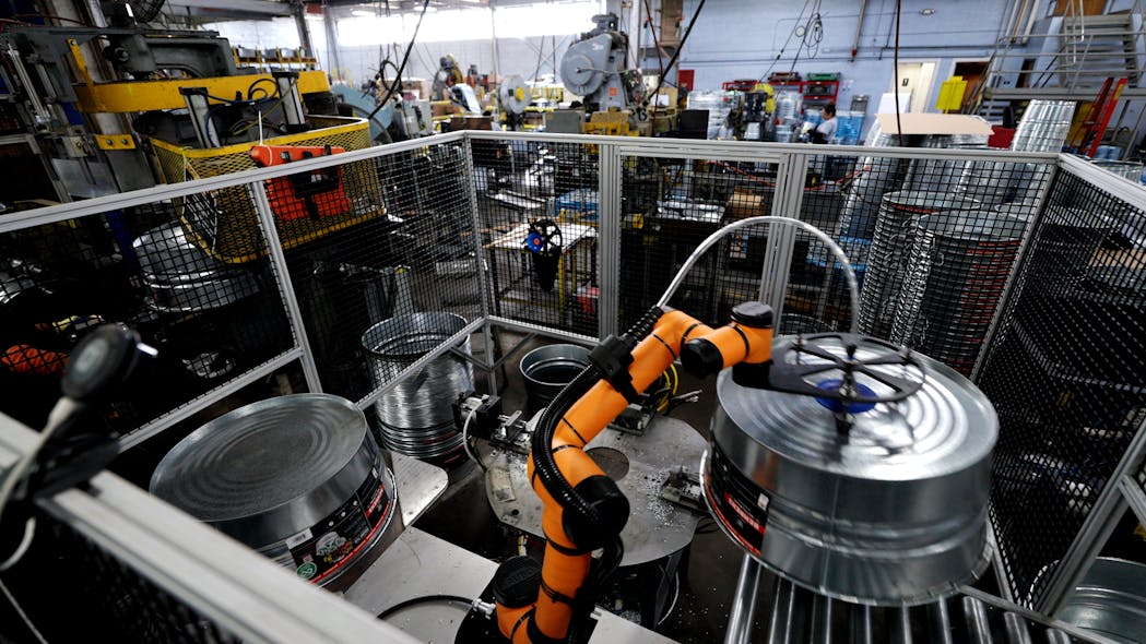 Figure 1: The Rapid Machine Operator is a fully integrated, purpose-built, six-axis robotic arm work cell that is designed to automate crucial but repetitive tasks so that human labor can be redeployed to more complex work.