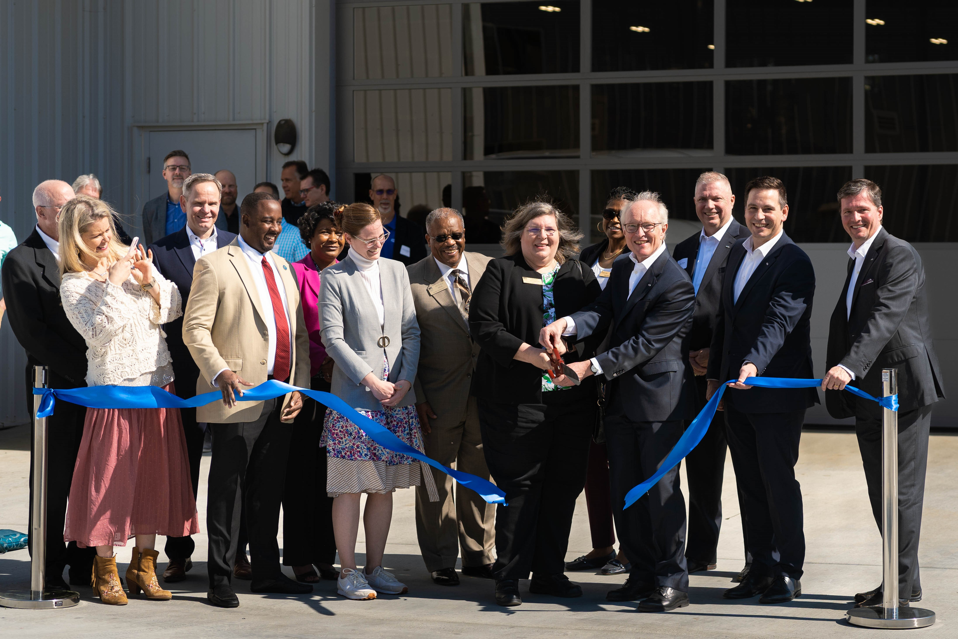 Figure 1: Schmalz executives and local government officials gathered for a ribbon cutting ceremony, beginning expansions at the Raleigh, North Carolina, facility.