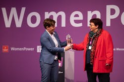 Dr. Christina Franke, head of engineering for the assembly technology business unit at Bosch Rexroth, accepts the 2023 Engineer Powerwoman award from WomenPower Career Congress advisory board jury chairperson Prof. Barbara Schwarze from the Competence Center Technology-Diversity-Equal Opportunities (kompetenzz), based in Bielefeld, Germany.
