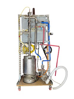 Figure 1: A pilot-size prototype distillation system was developed for convenient testing. The PLC/HMI control panel and all associated wiring and instrumentation were mounted onboard. (Source: Team Still Standing)