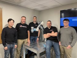 Flexiv Robotics Application Engineer Dajun Tao (left) meets the Cardinal Machine team. Flexiv Robotics Application Engineer Dajun Tao (left) meets the Cardinal Machine team.