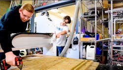 Kaidan Blair, senior project manager (left) and Quin McClenahen, maufacturing lead (right), UHS Robotics Team. Kaidan Blair, senior project manager (left) and Quin McClenahen, maufacturing lead (right), UHS Robotics Team.