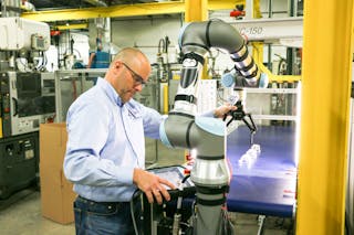 Figure 1: Jon Gelston, owner of Colorado-based injection molding company Aim Processing, had very little direct experience with robot programming and used the resources he found through the free online portion of the UR Academy.