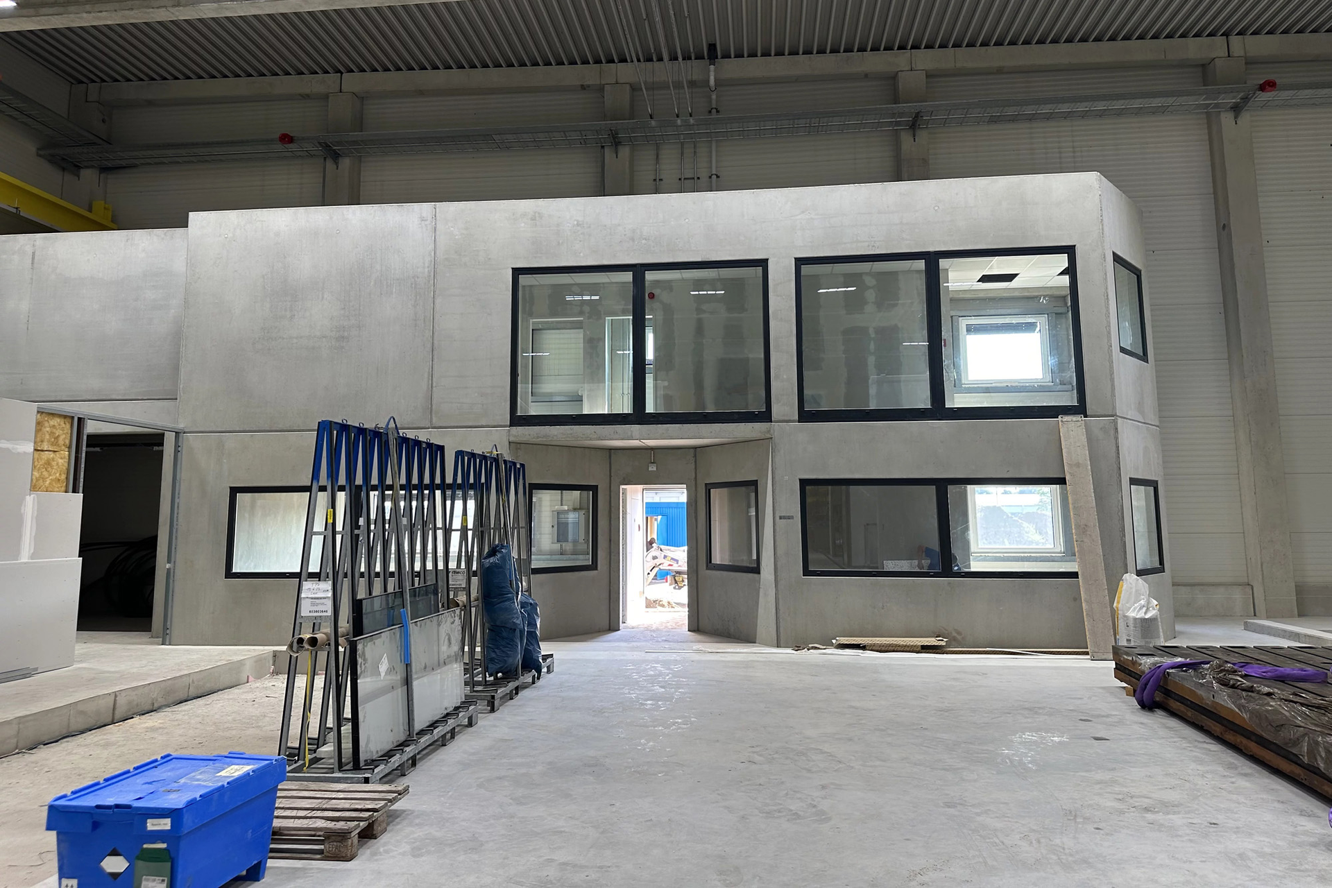 The Menzel Elektromotoren plant is progressing towards on-schedule completion. The test field cabin includes a customer lounge.