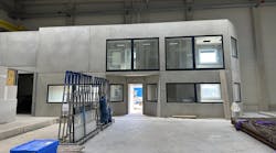 The Menzel Elektromotoren plant is progressing towards on-schedule completion. The test field cabin includes a customer lounge. The Menzel Elektromotoren plant is progressing towards on-schedule completion. The test field cabin includes a customer lounge.