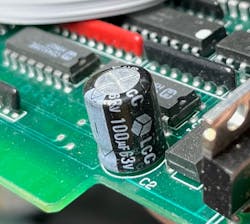 Figure 1: The signs that the capacitor is the problem are discoloration on the board below the cap where it has leaked or a bulging top of the cap where it has gotten too hot and vaporized the electrolyte. Figure 1: The signs that the capacitor is the problem are discoloration on the board below the cap where it has leaked or a bulging top of the cap where it has gotten too hot and vaporized the electrolyte.