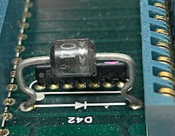 Figure 2: A large resistor or diode that is mounted so that the body of it is positioned well above the board is a sign that it is a sacrificial component that will give its life to save the rest of the board. Figure 2: A large resistor or diode that is mounted so that the body of it is positioned well above the board is a sign that it is a sacrificial component that will give its life to save the rest of the board.