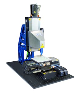 Figure 6: Typical setup of XY linear motor stages and vertical stage supporting laser head. Figure 6: Typical setup of XY linear motor stages and vertical stage supporting laser head.