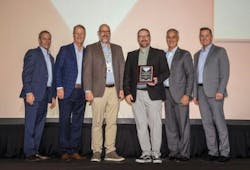 Kundinger representatives are accepting the award from Parker Hannifin representatives at the Parker National Sales Meeting: Michael Delaney (from left), vice president of industrial sales and distribution, Parker; Michael O’Hara, vice president of global sales and marketing, Parker; Tom E. Kundinger, vice president and chief operating officer, Kundinger; Paul Kundinger, president, Kundinger; Andrew Ross, president and chief operating officer, Parker; and Douglas Gilbert, vice president of sales and marketing, Parker. Kundinger representatives are accepting the award from Parker Hannifin representatives at the Parker National Sales Meeting: Michael Delaney (from left), vice president of industrial sales and distribution, Parker; Michael O’Hara, vice president of global sales and marketing, Parker; Tom E. Kundinger, vice president and chief operating officer, Kundinger; Paul Kundinger, president, Kundinger; Andrew Ross, president and chief operating officer, Parker; and Douglas Gilbert, vice president of sales and marketing, Parker.