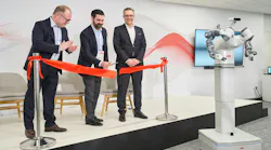 ABB's Marc Segura, John Bubnikovich and Sami Atiya cut the ribbon on ABB Robotics renovated facility.