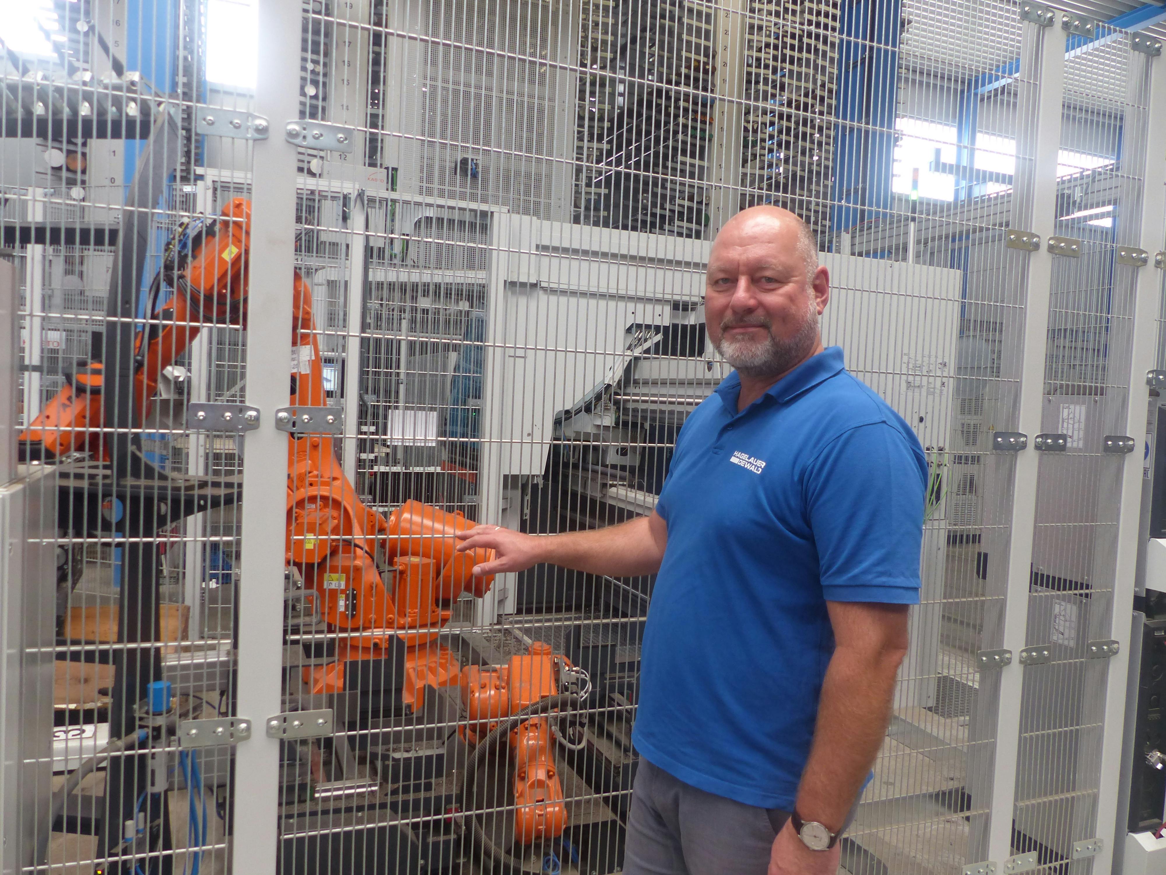 Figure 6: The robot automatically attaches a barcode to the cut pieces.