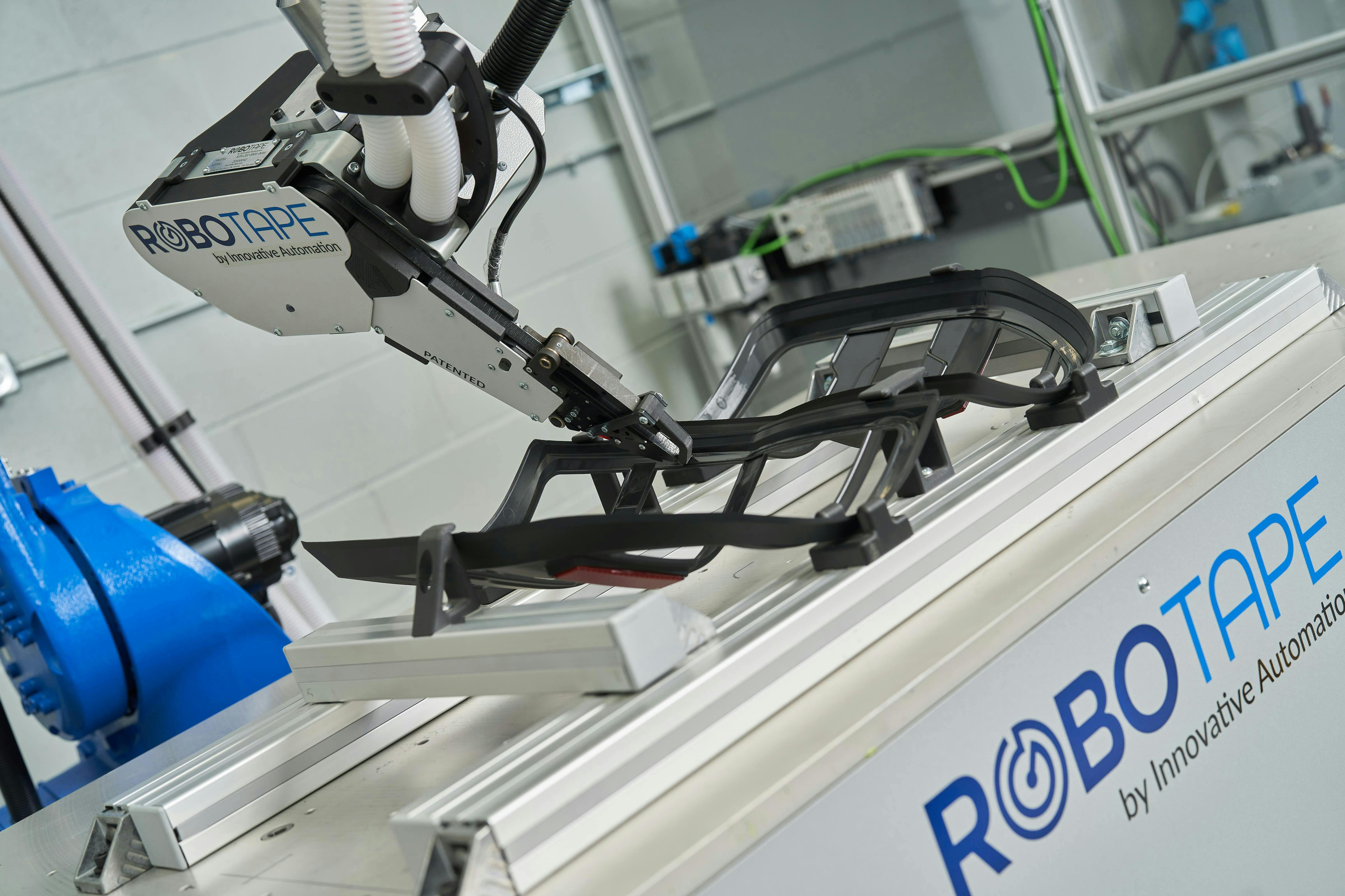 Figure 1: The RoboTape system offers a scalable, automated solution for applying industrial adhesive tapes. Figure 1: The RoboTape system offers a scalable, automated solution for applying industrial adhesive tapes.