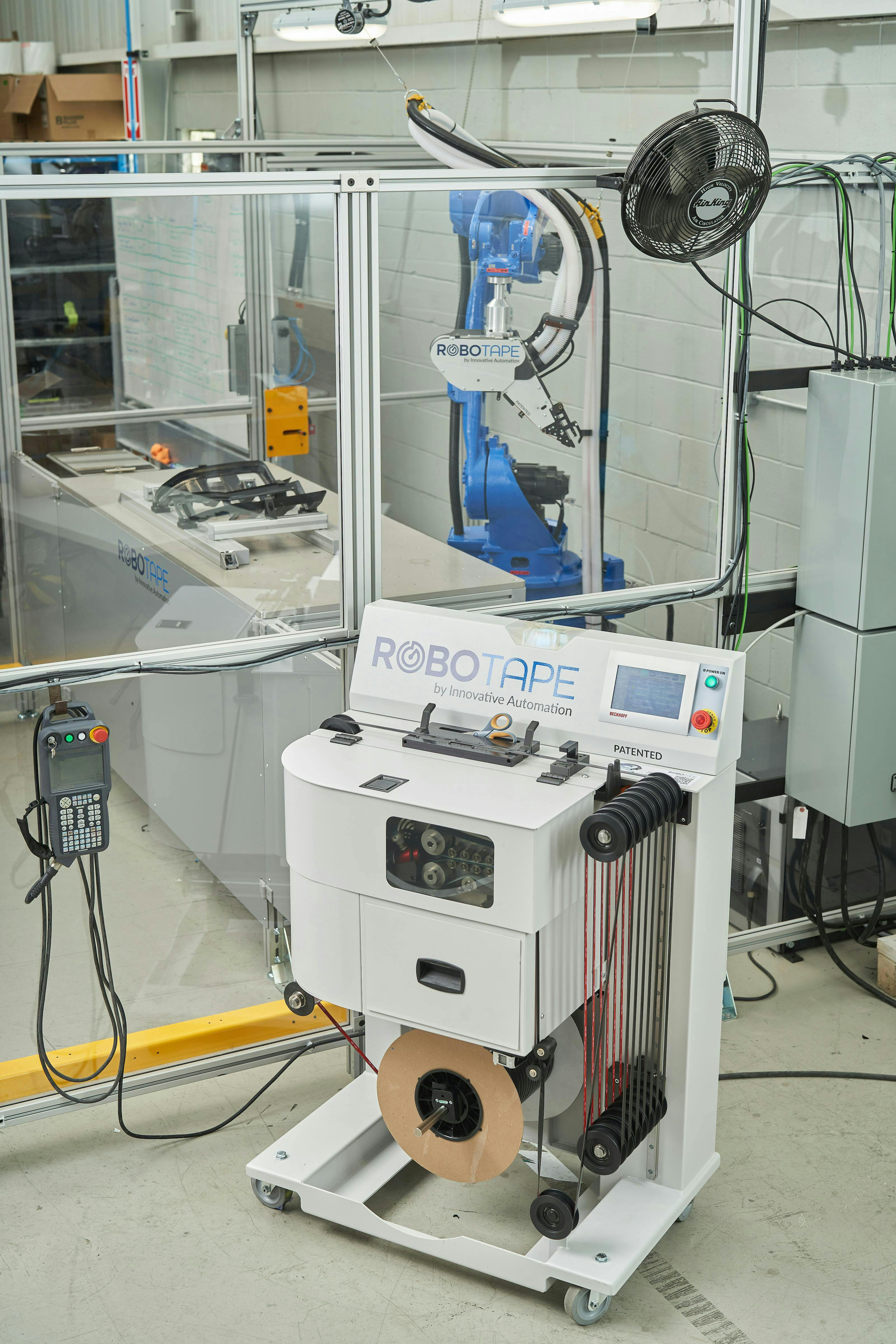 Figure 8: The RoboTape&rsquo;s remote feeding system allows operators to change spools without entering the robot cell, eliminating potential hazards.