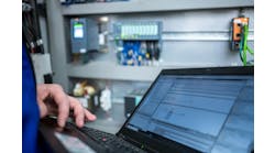 Programmer of PLC checks correct function of program Programmer of PLC checks correct function of program