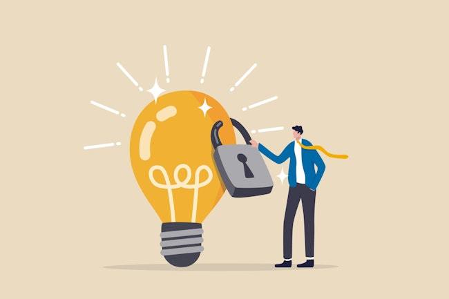 businessman standing with light bulb idea locked with padlock for patents