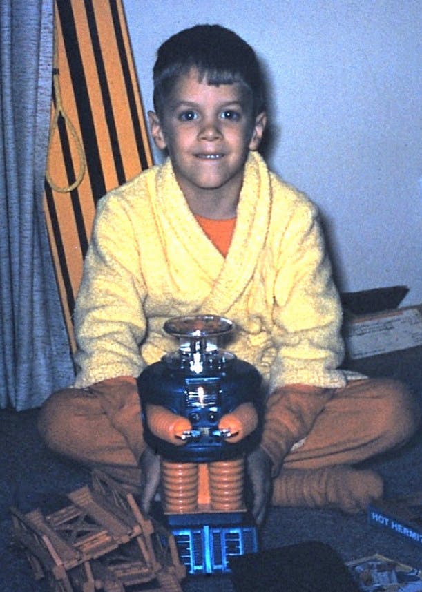 Figure 1: Stuart Shepherd, winner of the 2025 Joseph F. Engelberger Robotics Award for Leadership, developed an affinity for robots as early as Christmas 1966, when he received a replica of the Environmental Control Robot from the Lost in Space television show.