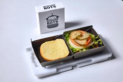 Figure 1: A freshly cooked burger is placed into a burger box with a QR code, which will let the robots know how to serve up the burger. Figure 1: A freshly cooked burger is placed into a burger box with a QR code, which will let the robots know how to serve up the burger.
