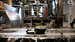 Figure 2: As it moves along the conveyor, the IRB 360 FlexPicker hygienically performs high-speed topping selection, guided by the data stored in the QR code. Next, the YuMi steps in to collaborate on the final assembly of the burger. Figure 2: As it moves along the conveyor, the IRB 360 FlexPicker hygienically performs high-speed topping selection, guided by the data stored in the QR code. Next, the YuMi steps in to collaborate on the final assembly of the burger.