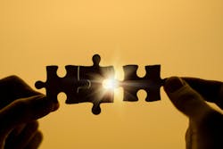 puzzle pieces fitting together puzzle pieces fitting together