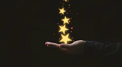 Hand holding stars
