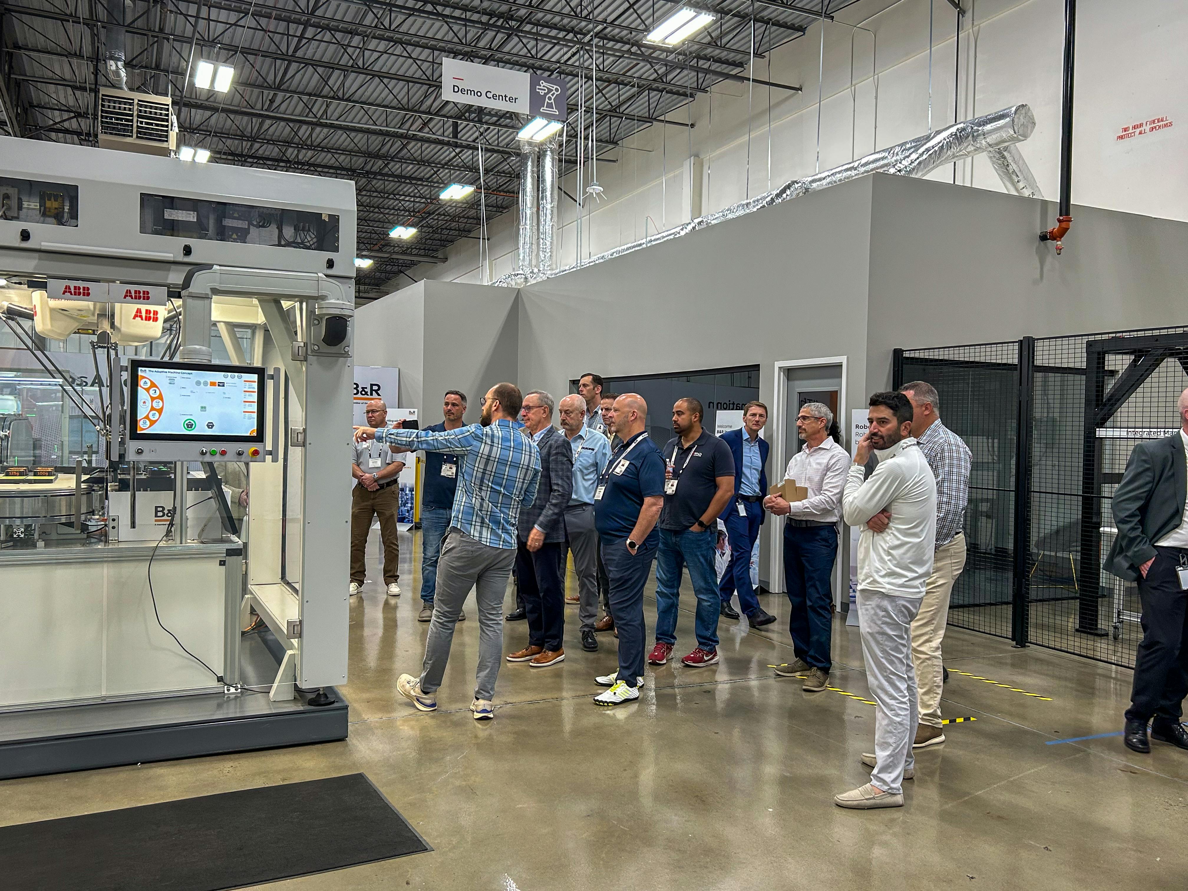 An executive group tours B&R's office in Alpharetta, Georgia, visiting the Innovation Space.