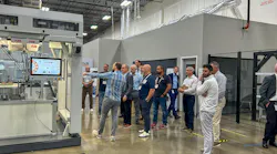 An executive group tours B&R's office in Alpharetta, Georgia, visiting the Innovation Space.