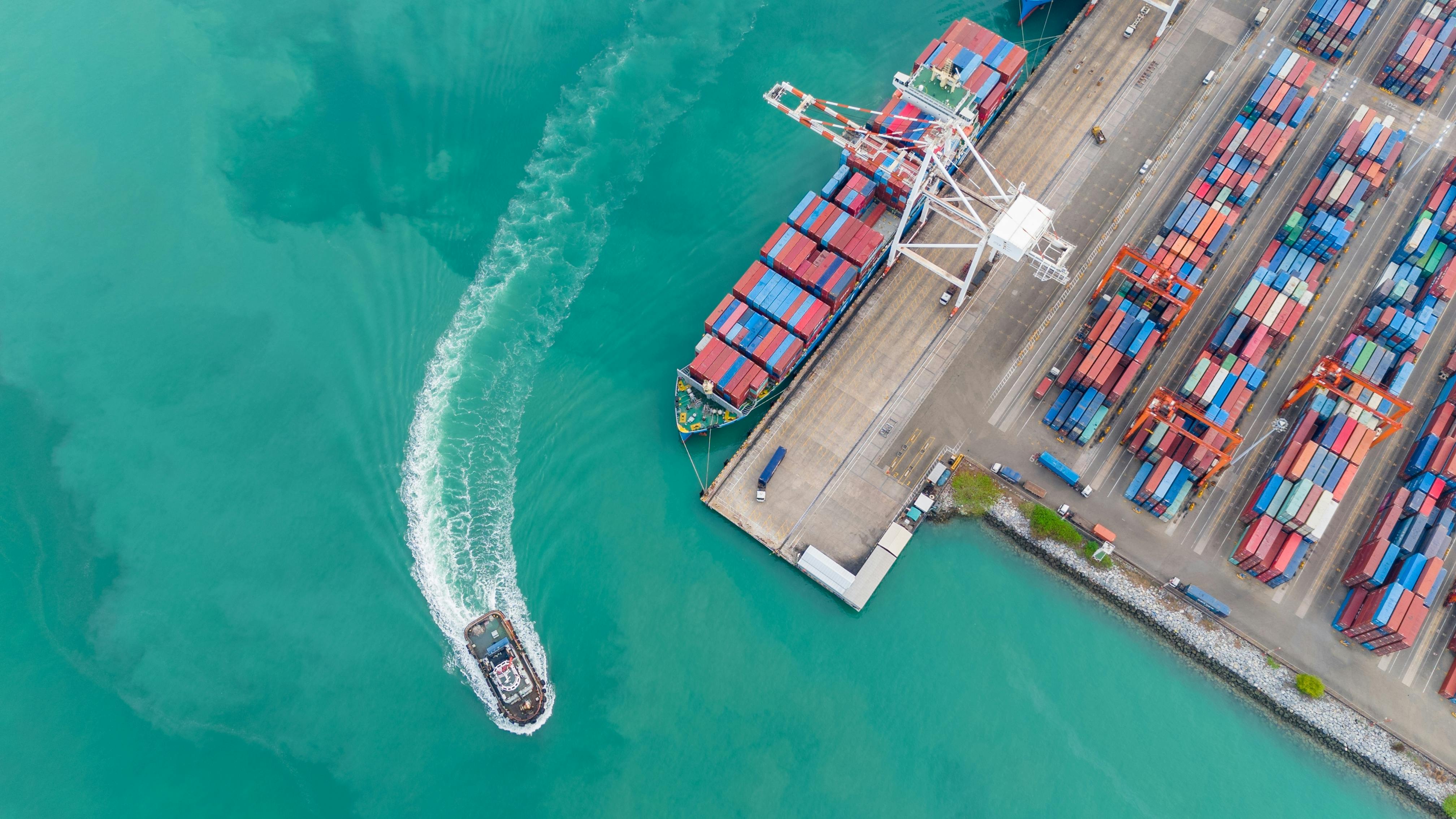 EndeavorB2B supply chain webinar: boat leaving a port presumably shipping supply chain materials