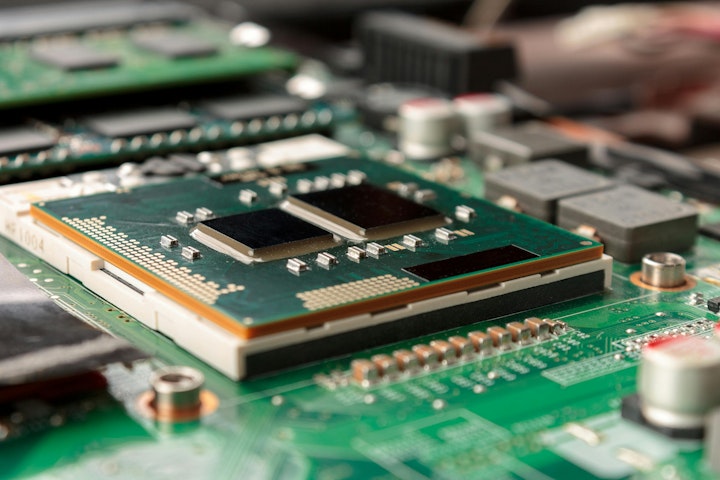 computer CPU close-up on the motherboard background, socket of central process unit, connection of cpu with motherboard, the structure of the processor chip, multi-core and multi-threading