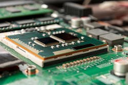 computer CPU close-up on the motherboard background, socket of central process unit, connection of cpu with motherboard, the structure of the processor chip, multi-core and multi-threading computer CPU close-up on the motherboard background, socket of central process unit, connection of cpu with motherboard, the structure of the processor chip, multi-core and multi-threading