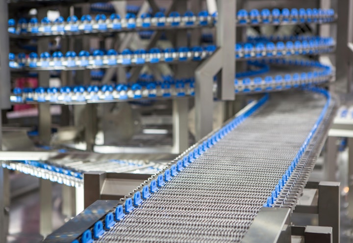 Conveyor belt system in food industry production line.