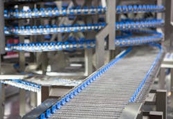 Conveyor belt system in food industry production line. Conveyor belt system in food industry production line.
