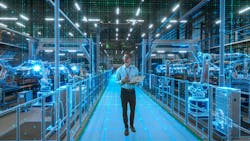 Engineer With Laptop Activates Autonomous EV Factory Digitization. Visualization Shows Robotic Arms, Assembly Line, Digital Twin Lines of Data, Computer Vision Transformation Manufacturing Technology Engineer With Laptop Activates Autonomous EV Factory Digitization. Visualization Shows Robotic Arms, Assembly Line, Digital Twin Lines of Data, Computer Vision Transformation Manufacturing Technology