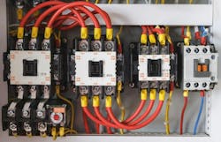 Close-up electrical wiring with fuses and contactors. Close-up electrical wiring with fuses and contactors.